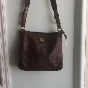 Fossil cross body brown purse.